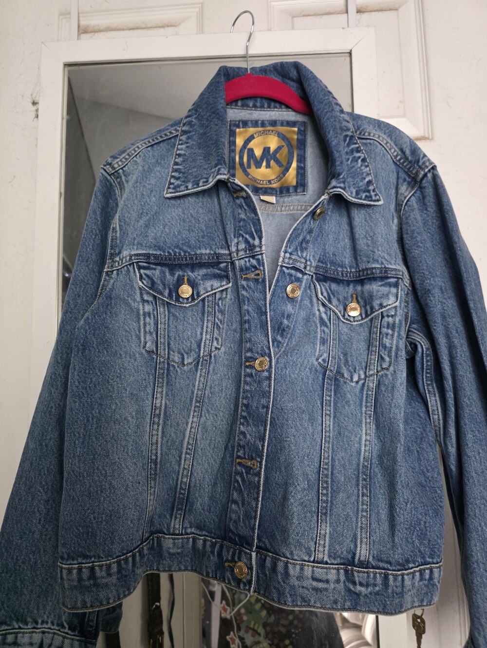 New Michael Kors Light Blue Denim Trucker Jacket with Gold Buttons